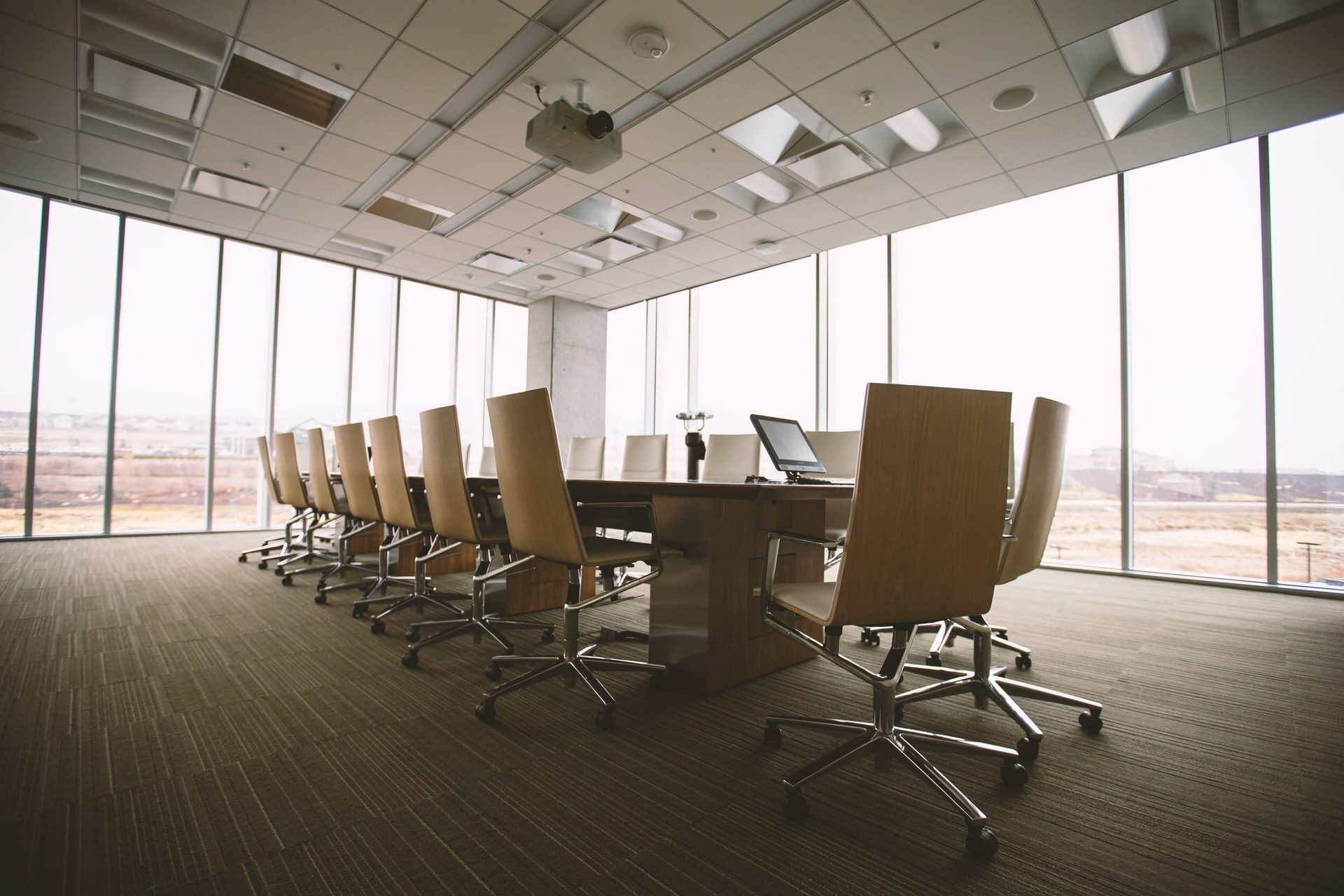 Boardroom with floor-to-ceiling windows overlooking the city